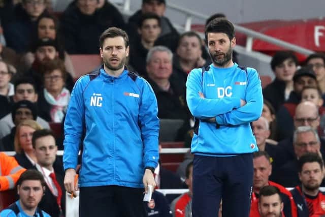 Danny Cowley, right, and 
Nicky Cowley look on during Lincoln City's FA Cup clash against Arsenal at the Emirates Stadium back in 2017. Picture: Julian Finney/Getty Images.