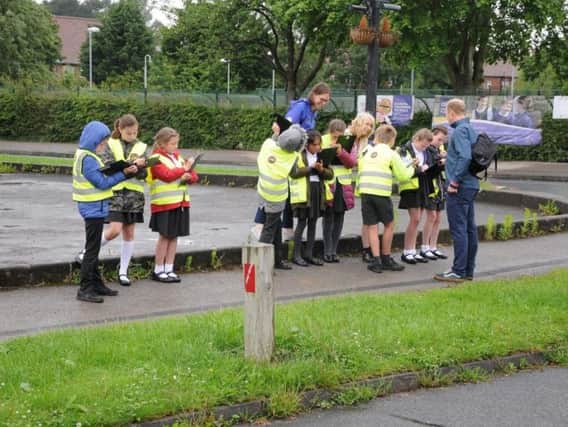 Children surveyed the area around the school to find out how streets could be safer and more attractive for walking & cycling. Photo: Steve Tipton/Sustrans