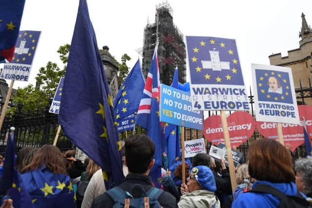 Anti-Brexit protests continue outside the House of Commons.