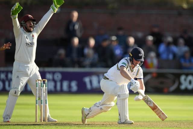 Steve Davies of Somerset appeals successfully for the wicket of Gary Ballance.