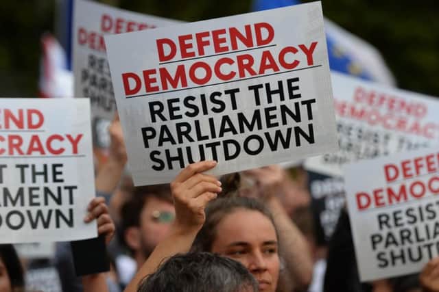 Protestors from Another Europe is Possible outside the Houses of Parliament, London, to demonstrate against Prime Minister Boris Johnson temporarily closing down the Commons. Photo: Kirsty O'Connor/PA Wire