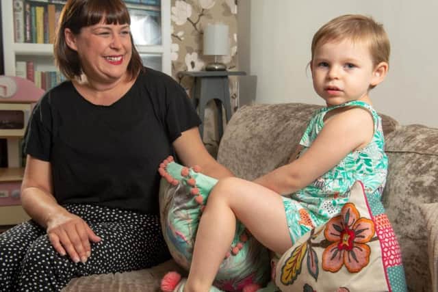 Caroline Day with her daughter Connie Annakin who has a fatal disease called batten syndrome, but will now be able to receive treatment which could delay its onset for decades. Picture and videos by Bruce Rollinson.