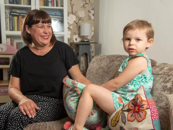 Caroline Day with her daughter Connie Annakin who has a fatal disease called batten syndrome, but will now be able to receive treatment which could delay its onset for decades. Picture and videos by Bruce Rollinson.