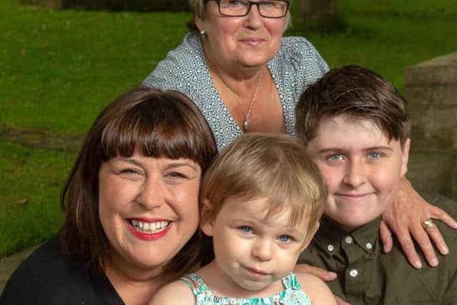 Caroline Day with Connie, Connie's brother Elliott, 13, and grandmother Mavis Day. The family, from Farsley, are overjoyed to hear that Connie will now be able to access treatment for Batten Disease on the NHS. Picture Bruce Rollinson