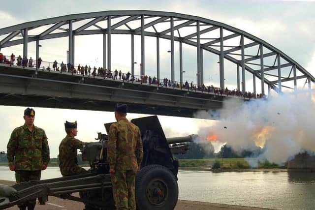 A cannon is released by John Frost Bridge in Arnhem, the site of the famous battle in 2004. Picture: PA