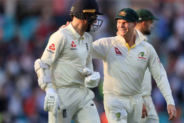 Australia's Steve Smith (right) chats to England's Jack Leach at the end of play.
