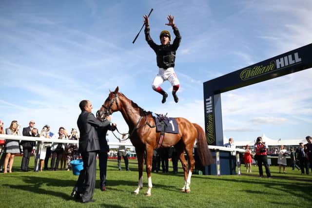 Frankie Dettori performed a flying dismount after Stradivarius landed the Doncaster Cup yesterday.