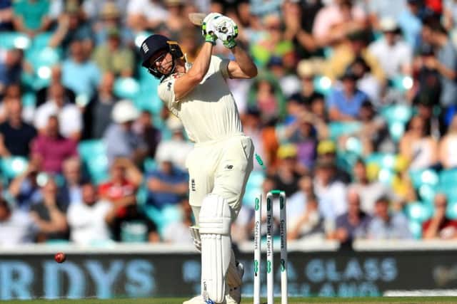 England's Jos Buttler is bowled by Australia's Pat Cummins during day two of the fifth test match at The Oval (Picture: PA)