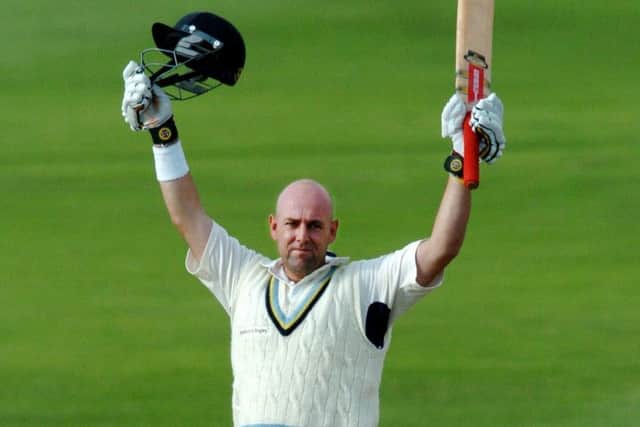 LEGEND: Darren Lehmann celebrates a century while playing for Yorkshire. Picture: Steve Riding.