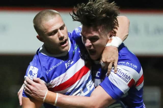 Wakefield Trinity's Ryan Hampshire celebrates scoring the first try against London (Picture: SWPix.com)