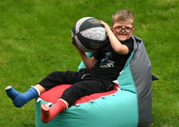 Five-year-old Lewis Connett from Halifax, who was born with the rare genetic condition Apert Syndrome, which means that many of his bones were fused including his skull, fingers and toes. He is now raising awareness of Jeans for Genes. Picture Jonathan Gawthorpe
