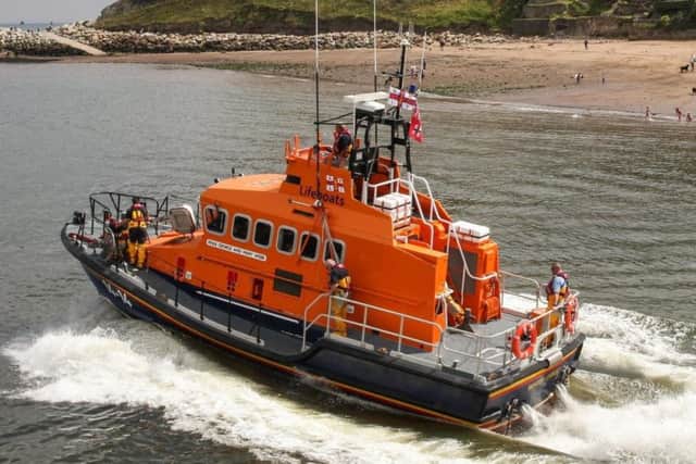 A lifeboat in action at Whitby - but should the RNLI be funding projects overseas?