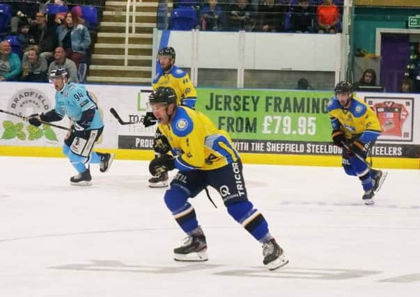 Steve Duncombe, Luke Boothroyd and Andres Kopstals, right, look to get a Chiefs attack going at Ice Sheffield on Sunday. Picture: Chris Stratford.