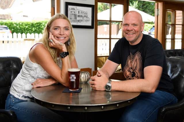Publican and model, Jodie Kidd presents a personalised blue plaque to Tom Kerridge, commemorating her favourite pub memory, which took place at The Hand and Flowers in Marlow