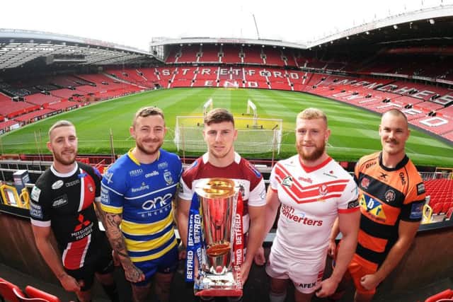 Salford's Jackson Hastings, far left, and Wigan's George Williams (holding Super League trophy) are in the running for Steve Prescott Man of Steel. Other players at play-offs launch are Warrington Wolves' Josh Charnley, St Helens' Luke Thompson and Castleford's Cheyse Blair (PIC: SWPIX)