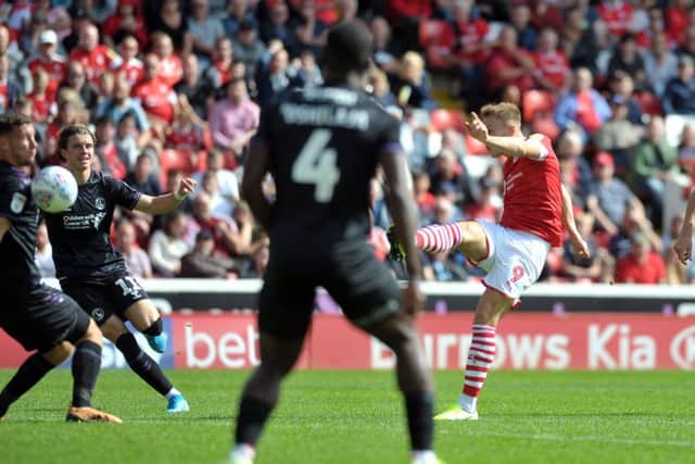 Award-winning strike: Cauley Woodrow scores against Charlton. Picture: Tony Johnson