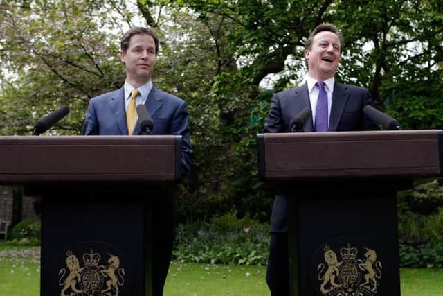 David Cameron and Nick Clegg during their 'Rose Garden' press conference to announce the formation of the Coalition Government in 2010. Picture: PA