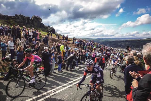 Tough going: Sir Bradley Wiggins makes his way up the Cow and Calf climb in Ilkley during Stage 3 of the Tour de Yorkshire.