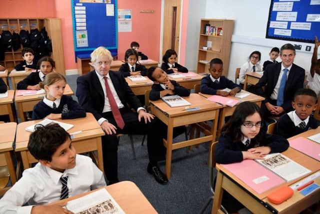 Gavin Williamson (right) during a recent visit to a free school with Boris Johnson.