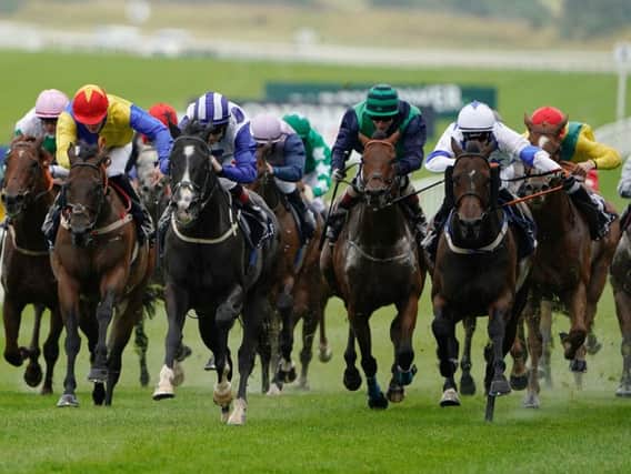 GOING FOR GOLD: Buffer Zone and Colin Keane land the Irish Stallion Farms EBF 'Bold Lad' Sprint Handicap at the Curragh. Photo by Alan Crowhurst/Getty Images.