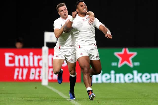 England's Manu Tuilagi (right) celebrates scoring his sides secong try with George Ford. Picture: David Davies/PA
