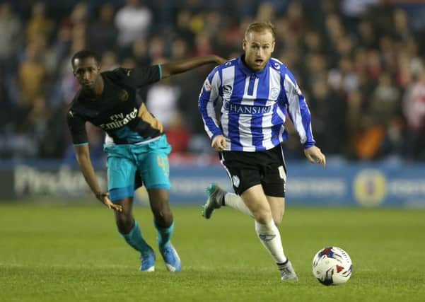 Remember this?: Wednesday's Barry Bannan escapes Arsenals Glen Kamara in the 2015 Capital One League Cup encounter.