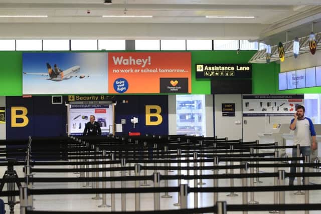 Empty check-in desks after Thomas Cook went into liquidation.
