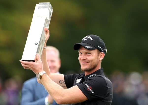 England's Danny Willett with the trophy after winning the BMW PGA Championship at Wentworth Golf Club, Surrey. (PIcture: PA)