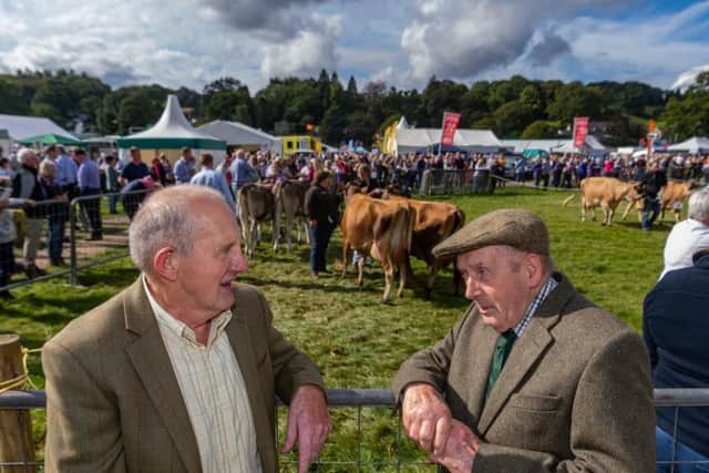 Farmer Malcolm Swires chats with Raymond Johnson of Kettlesing near Harrogate at Nidderdale Show. Picture by James Hardisty.