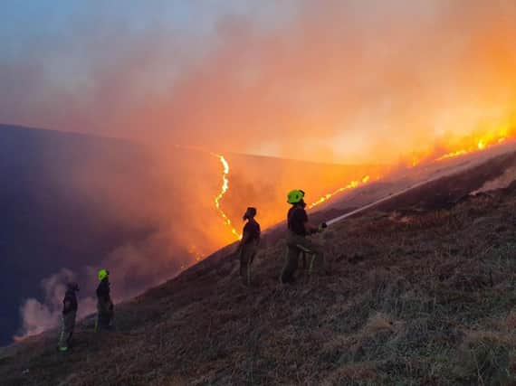 West Yorkshire Fire and Rescue Firefighters tackle the blaze at Marsden, Easter 2019.