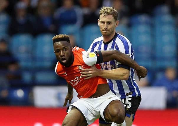On comeback trail: Sheffield Wednesday's Tom Lees, right.