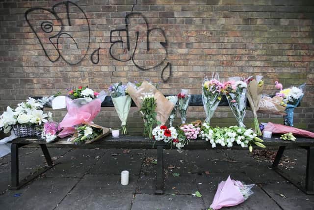 Floral tributes are left for Libby Squire, 21, at a bench on Beverley Road, Hull, where the student was last seen on February 1. Picture: Tom Maddick/SWNS