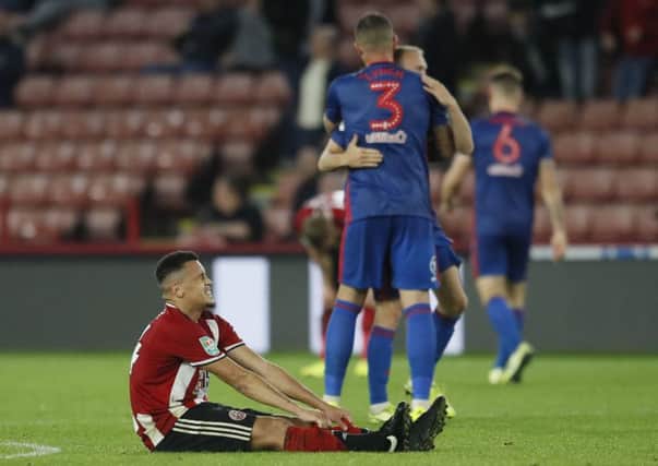 Ravel Morrison of Sheffield Utd dejected on the final whistle of the Carabao Cup match at Bramall Lane, Sheffield. (Picture: Simon Bellis/Sportimage)