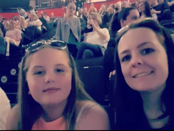 Hollie Booth is pictured with her aunt Kelly Brewster, who was killed in the Manchester Arena bombing in 2017.