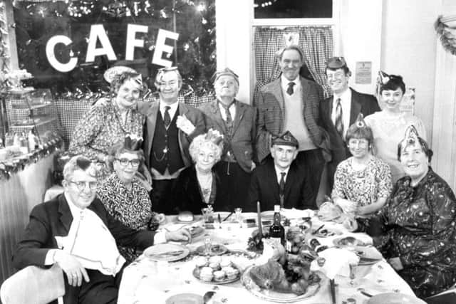 The cast of Last of the Summer Wine in the 1989 Christmas special. Back row (left to right): Ivy (Jane Freeman), Clegg (Peter Sallis), Compo (Bill Owen), Seymour (Michael Aldridge), Barry (Mike Grady) and Glenda (Sarah Thomas). Front row (left to right): Wesley (Gordon Wharmby), Edie (Thora Hird), Aunty Wainwright (Jean Alexander), Howard (Robert Fyfa), Pearl (Juliette Kaplan) and Nora (Kathy Staff).