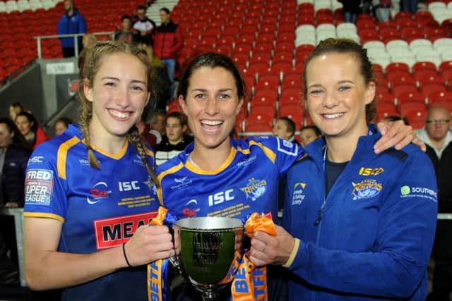 Caitlin Beevers, celebrating her 18th birthday, Courtney Hill, captain and Lois Forsell, club captain for Leeds Rhinos