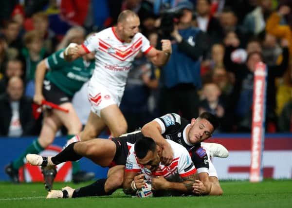 St Helens' Zeb Taia scores his side's second try of the game at Old Trafford. Picture: Martin Rickett/PA