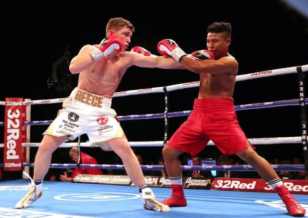 Dominant: Reece Mould, left, and Bayardo Ramos in Leeds  Arena action.