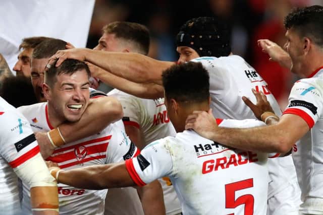 St Helens' Mark Percival celebrates scoring his side's fourth try at Old Trafford. Picture: Martin Rickett/PA