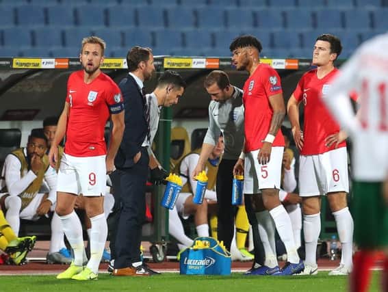 England's Tyrone Mings speaks with Gareth Southgate. Picture: Catherine Ivill/Getty Images