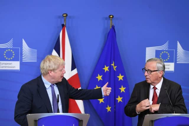 Boris Johnson and Jean-Claude Juncker at a brief news conference.