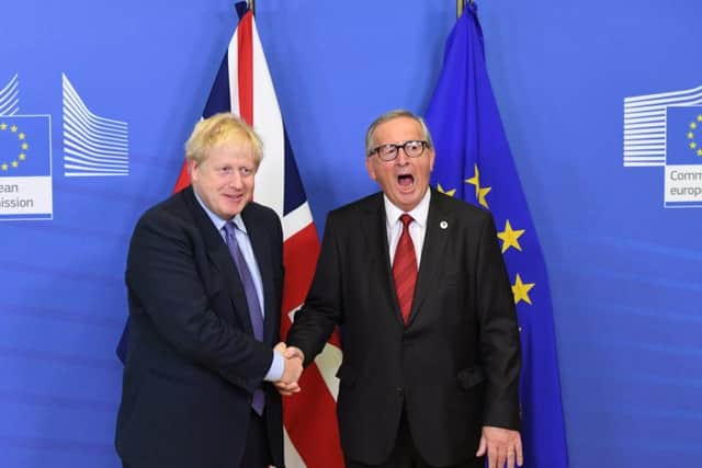Boris Johnson with EU president Jean-Claude Juncker.