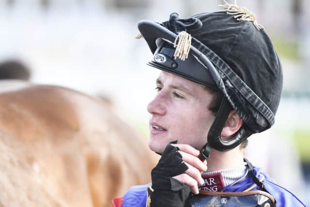 The new champion jockey Oisin Murphy after winning in the Royal colours aboard the Queen's horse Kings Lynn at Doncaster's St Leger meeting.