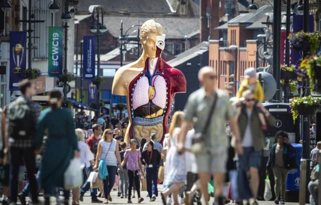 A six metre-tall Damien Hirst painted bronze sculpture, Hymn (1999-2005), stands in Leeds city centre for the opening of Yorkshire Sculpture International, the UK's largest dedicated sculpture festival.