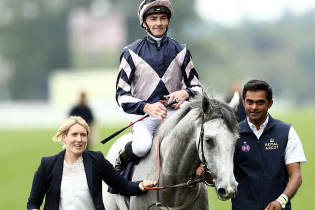 Danny Tudhope and the grey Lord Glitters after their Royal Ascot win in the Queen Anne Stakes.