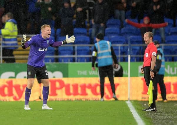 An angry Owls keeper Cameron Dawson unhappy with Cardiff's equaliser. Picture: Steve Ellis