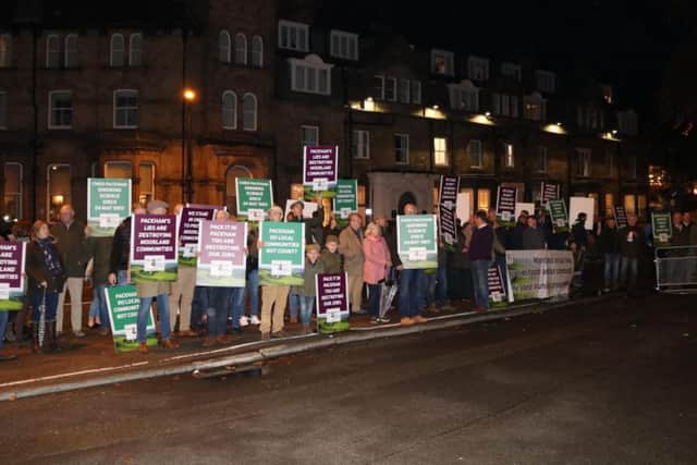 Demonstrators from the Yorkshire Moorland Communities braved the weather to take a message to BBC Presenter Chris Packham as he arrived at the Royal Hall in Harrogate to give a talk.