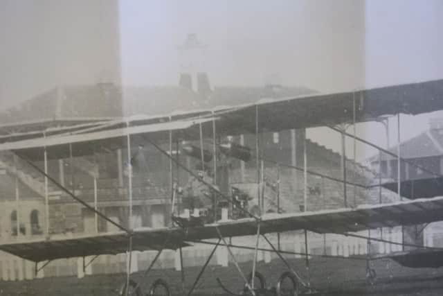 Roger Sommer in his biplane after its flight in 1909.