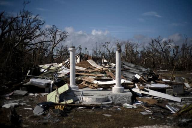 The portico of a house destroyed by Hurricane Dorian is the only thing that stands of the structure, destroyed by Hurricane Dorian, in High Rock, Grand Bahama, Bahamas. Picture: AP Photo/Ramon Espinosa