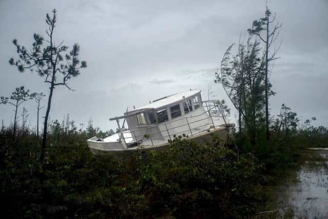 A boat thrown onshore by the Hurricane Dorian lays stranded next to a highway near Freeport, Grand Bahama.
Picture: AP Photo/Ramon Espinosa